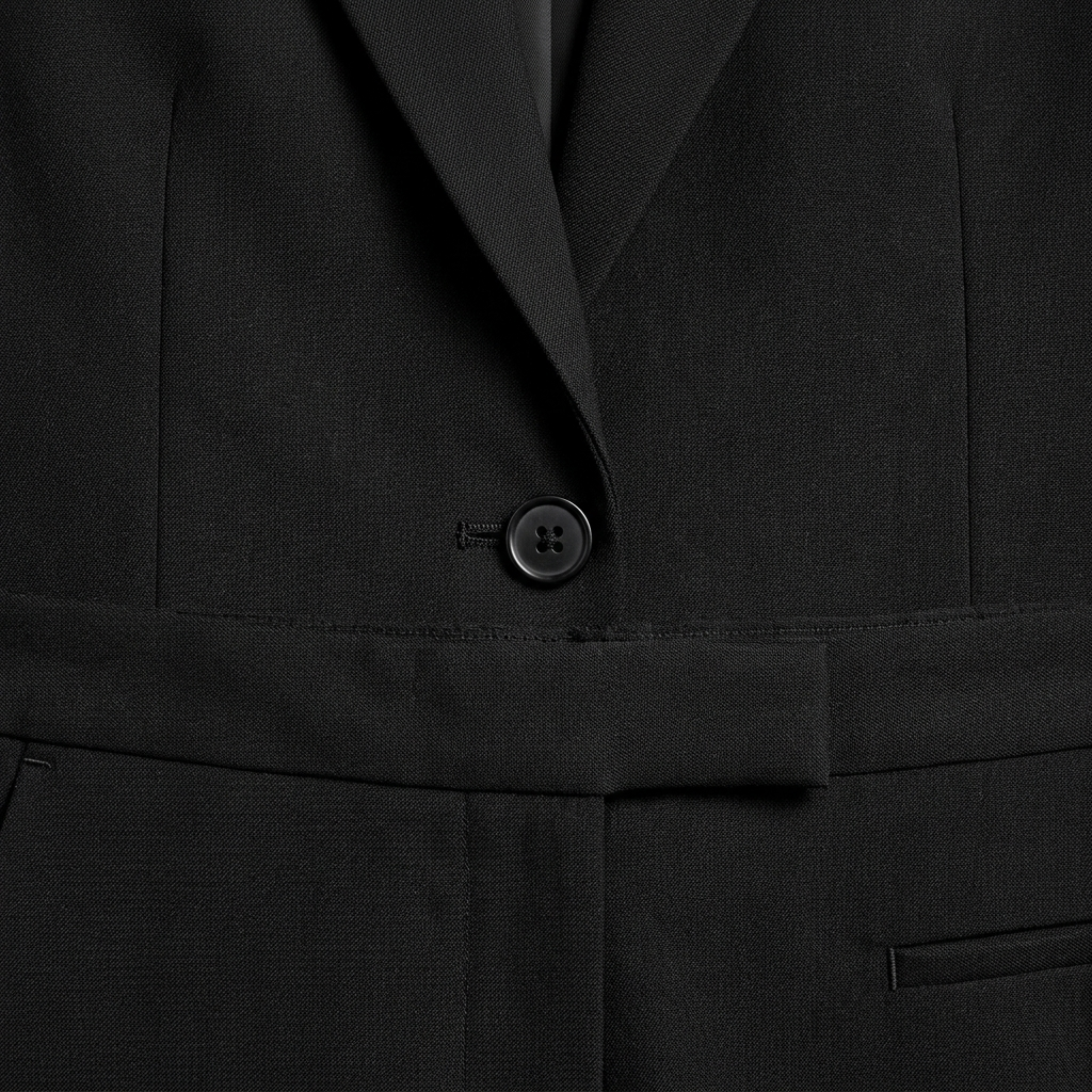 Women's tailored fit pants suit — two-piece blazer and trousers — business